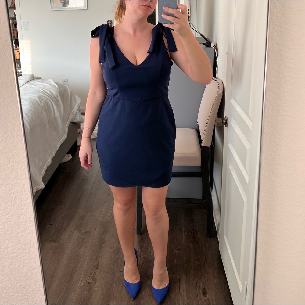 Brand new with tags Navy dress with shoulder tie detail